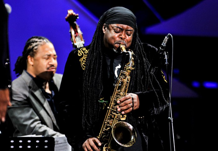 OSAKA, JAPAN - APRIL 30: James Genus (L) and Courtney Pine perform on stage at the 2014 International Jazz Day Global Concert on April 30, 2014 in Osaka, Japan. (Photo by Keith Tsuji/Getty Images for Thelonious Monk Institute of Jazz)
